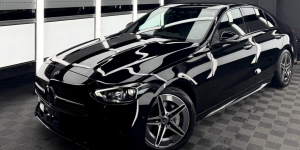 Black Mercedes-Benz C-Class with paint protection film.