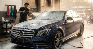 A blog banner image showing a car getting detailing services.