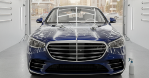 A blog banner image showcasing a luxury car getting detailing.
