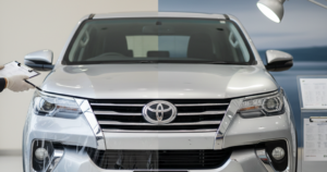 A blog banner image showcasing a silver car