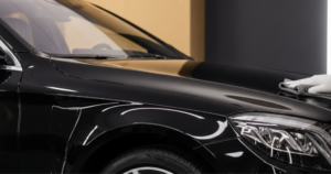A blog banner image showing Ceramic Coating on a luxury car